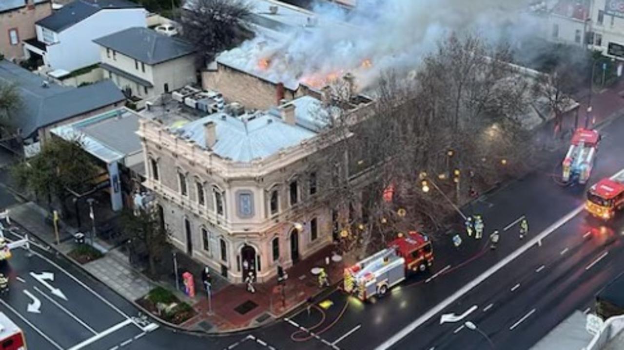 Man arrested after heritage pub burns