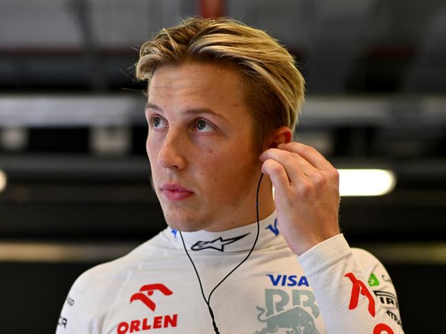 ABU DHABI, UNITED ARAB EMIRATES - DECEMBER 08: Liam Lawson of New Zealand and Visa Cash App RB prepares to drive in the garage prior to the F1 Grand Prix of Abu Dhabi at Yas Marina Circuit on December 08, 2024 in Abu Dhabi, United Arab Emirates. (Photo by Rudy Carezzevoli/Getty Images)