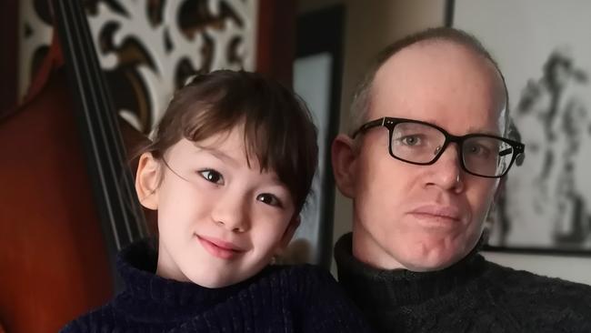 South Australian geophysicist Simon Carter and daughter Imogen are ‘locked up’ in a Wuhan apartment.