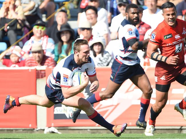 Rebels' Dane Haylett Petty dives over to score a try. Picture: Charly Triballeau/AFP