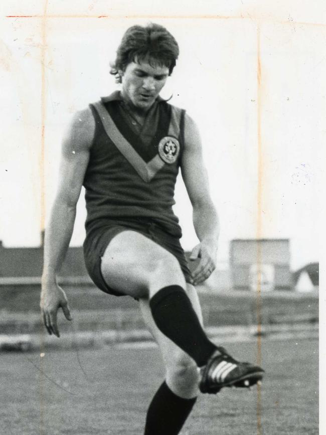 Former West Adelaide footballer Lee Ravlich practising his kicking technique at training in August 1976.