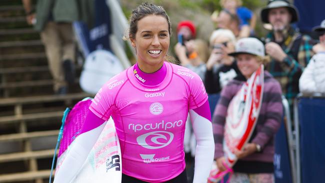 Sally Fitzgibbons of Australia (pictured) heads down the beach for her Round 3 heat at the Rip Curl Pro Bells Beach on Saturday March 25, 2016. PHOTO: Â©Â WSL / Kirstin SOCIAL: @kirstinscholtz @wsl This is a hand-out image from the World Surf League and is royalty free for editorial use only, no commercial rights granted. The copyright is owned by World Surf League. Sale or license of the images is prohibited. ALL RIGHTS RESERVED.