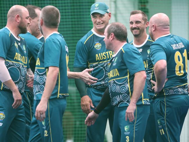 eThe Trans Tasman trophy for indoor cricket is being played on the Gold Coast at Ashmore.  Australia v New Zealand Mens 40s . Australian team huddle. Picture Glenn Hampson