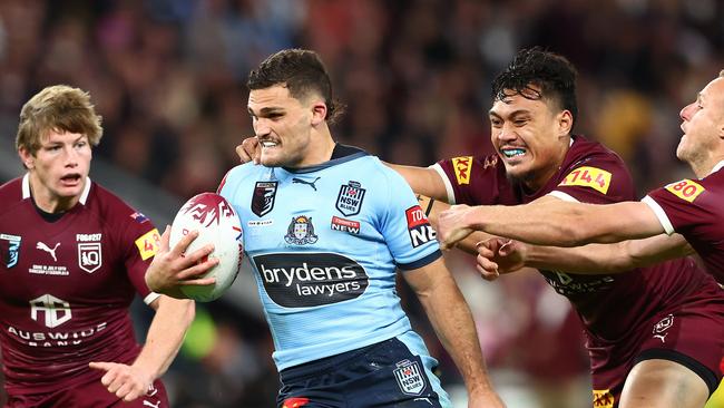 BRISBANE, AUSTRALIA - JULY 13: Nathan Cleary of the Blues is tackled during game three of the State of Origin Series between the Queensland Maroons and the New South Wales Blues at Suncorp Stadium on July 13, 2022, in Brisbane, Australia. (Photo by Chris Hyde/Getty Images)