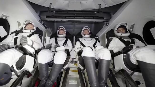 Astronauts Butch, Aleksandr, Nick, and Suni wait to exit the capsule after splashing down. Picture: SpaceX via AP