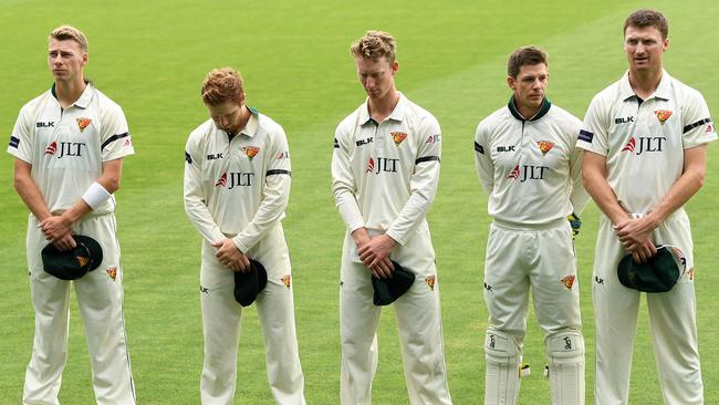 Tigers players observe a minute’s silence in response to the New Zealand mosque shootings prior to the commencement of play between Tasmania and New South Wales at Blundstone Arena. Picture: AAP/Dave Hunt