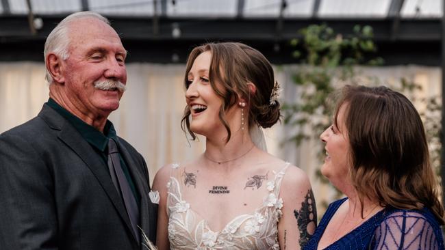 Mick Walker, who has been diagnosed with cancer, with his daughter Steph Walker and wife Raelene. Picture: Supplied by family