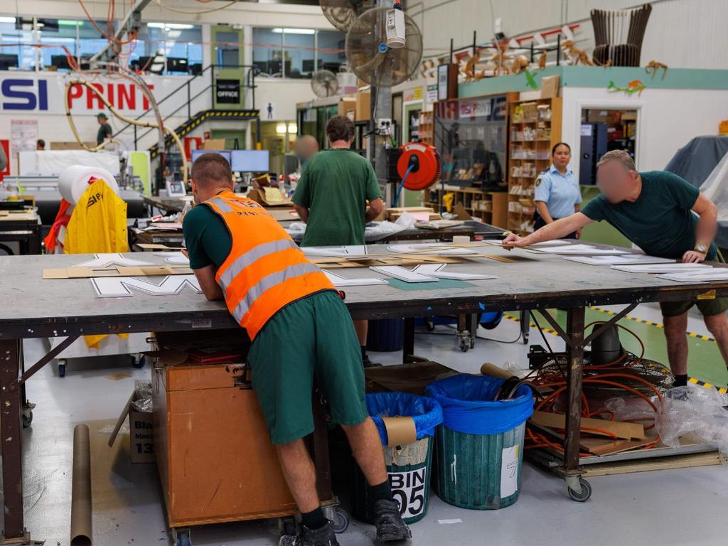 At the “print shop” where minimum security prisoners are making Coles “Meat, Diary, Milk” signs. Picture: Justin Lloyd.