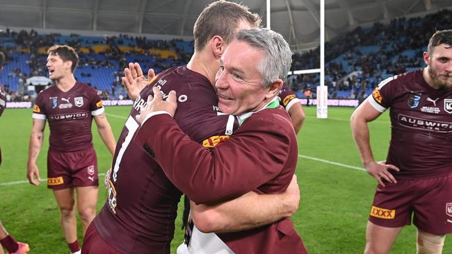 GOLD COAST, AUSTRALIA - JULY 14: Daly Cherry-Evans of the Maroons and Maroons coach Paul Green celebrate winning game three of the 2021 State of Origin Series between the New South Wales Blues and the Queensland Maroons at Cbus Super Stadium on July 14, 2021 in Gold Coast, Australia. (Photo by Bradley Kanaris/Getty Images)