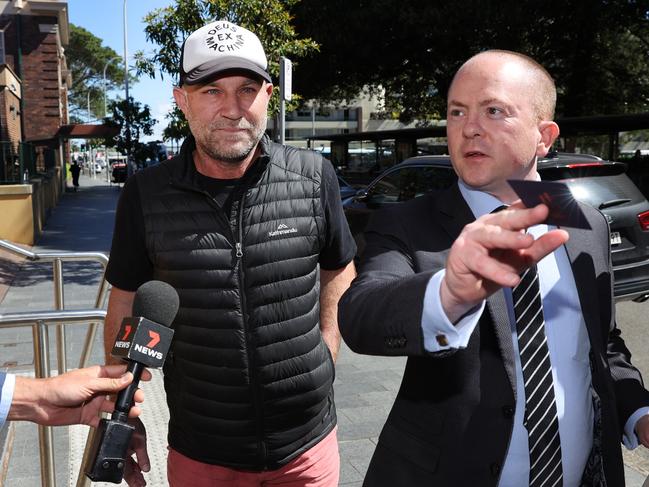 Michael Slater leaving Manly police station after he was arrested on domestic violence charges. Picture: Richard Dobson