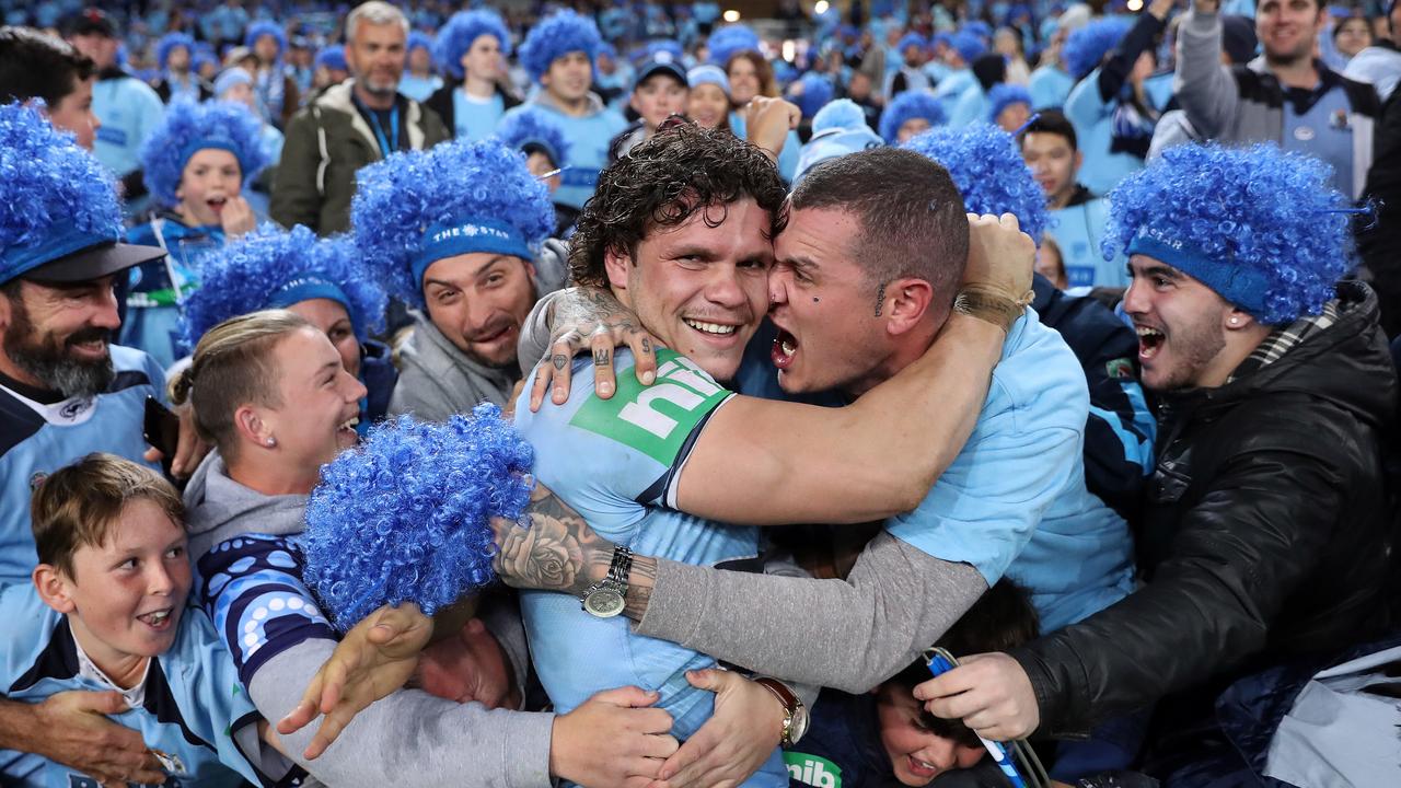 Relief! James Roberts celebrating NSW’s victory with Blues fans. Picture: Brett Costello