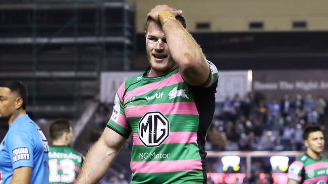 SYDNEY, AUSTRALIA - JULY 30:  Tom Burgess of the Rabbitohs walks off after being sent off by referee Gerard Sutton during the round 20 NRL match between the Cronulla Sharks and the South Sydney Rabbitohs at PointsBet Stadium, on July 30, 2022, in Sydney, Australia. (Photo by Matt King/Getty Images)