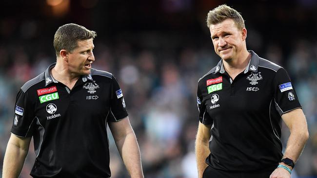 Magpies midfield coach Scott Burns (left) with Nathan Buckley. Picture: Getty Images