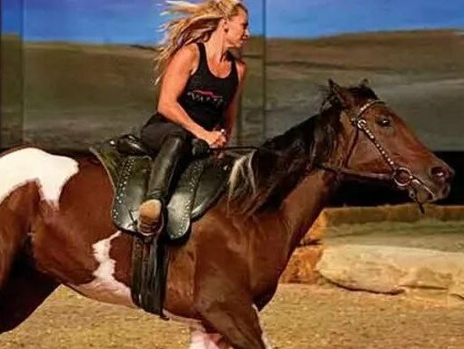 Tatyana Remley with one of her horses in a promo shoot for "Valitar." The couple first made headlines in 2013 after their multimillion-dollar equestrian acrobatic show suddenly closed, leaving the performers and crew stunned. Picture: Valitar