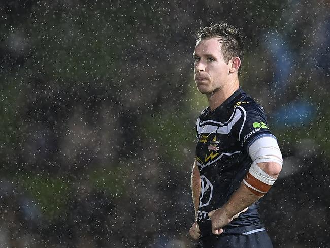 TOWNSVILLE, AUSTRALIA - MARCH 16: Michael Morgan of the Cowboys looks on in the rain during the round 1 NRL match between the North Queensland Cowboys and the St George Illawarra Dragons at 1300SMILES Stadium on March 16, 2019 in Townsville, Australia. (Photo by Ian Hitchcock/Getty Images)