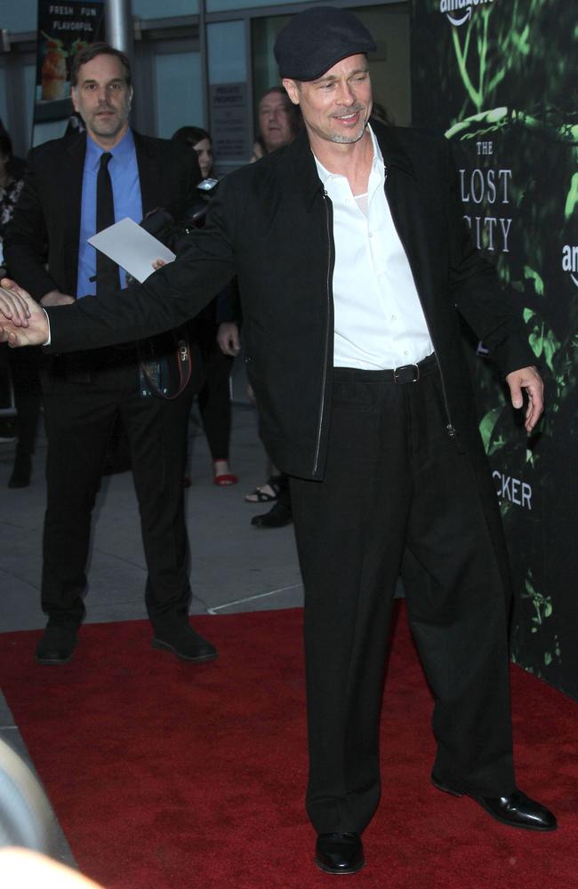 Pitt keeps things low-key in baggy pants and a jacket at the LA premiere.