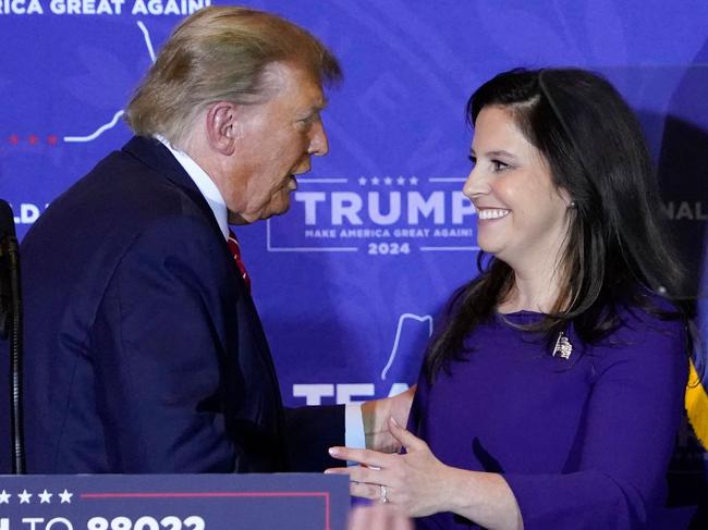 Donald Trump greets US Representative Elise Stefanik (R-NY) during a campaign event in Concord, New Hampshire. He has appointed her as envoy to the UN. Picture: AFP