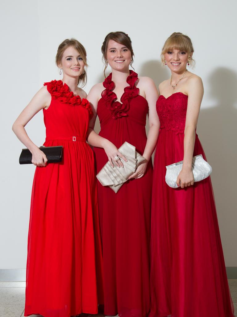 Emily Silburn, Kate Bremner and Sarah Bramham at the 2012 Kormilda College formal. Picture: SHANE EECEN / NT NEWS