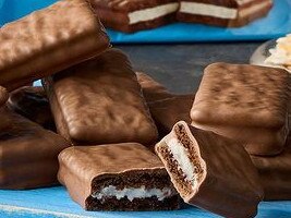 Tim Tam coconut cream chocolate biscuits.