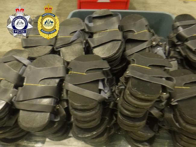 Australian Border Force officers discovered meth hidden in sandals inside a consignment of six boxes from Thailand. Images supplied Border Force/ Federal police