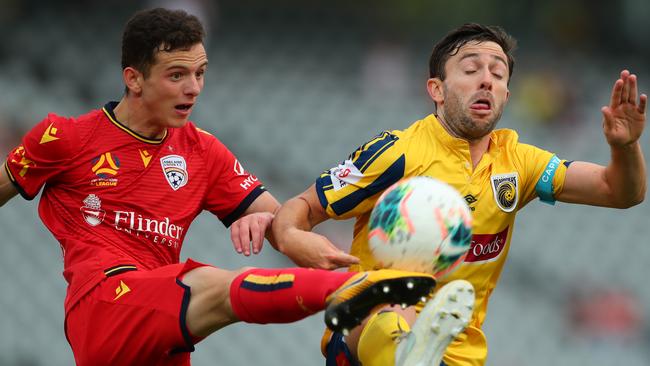 Adelaide United teenage talent Louis D’Arrigo in typically combative action. Picture: Tony Feder/Getty Images