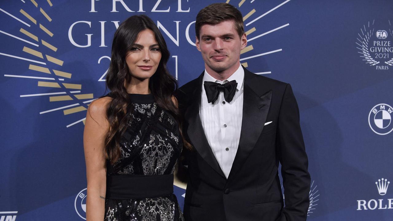 Max Verstappen and Kelly Piquet pose on the blue carpet ahead of the FIA gala. Picture: Julien De Rosa/AFP