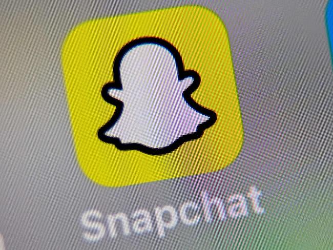 (FILES) In this file photo illustration taken on October 01, 2019, in Lille, France, shows the logo of mobile app Snapchat displayed on a tablet. - Snapchat on June 3, 2020, stopped promoting posts by US President Donald Trump, saying they incite racial violence. "We are not currently promoting the President's content on Snapchat's Discover platform," Snapchat said in response to an AFP inquiry referencing the youth-focused social network's section for  recommended content. (Photo by DENIS CHARLET / AFP)