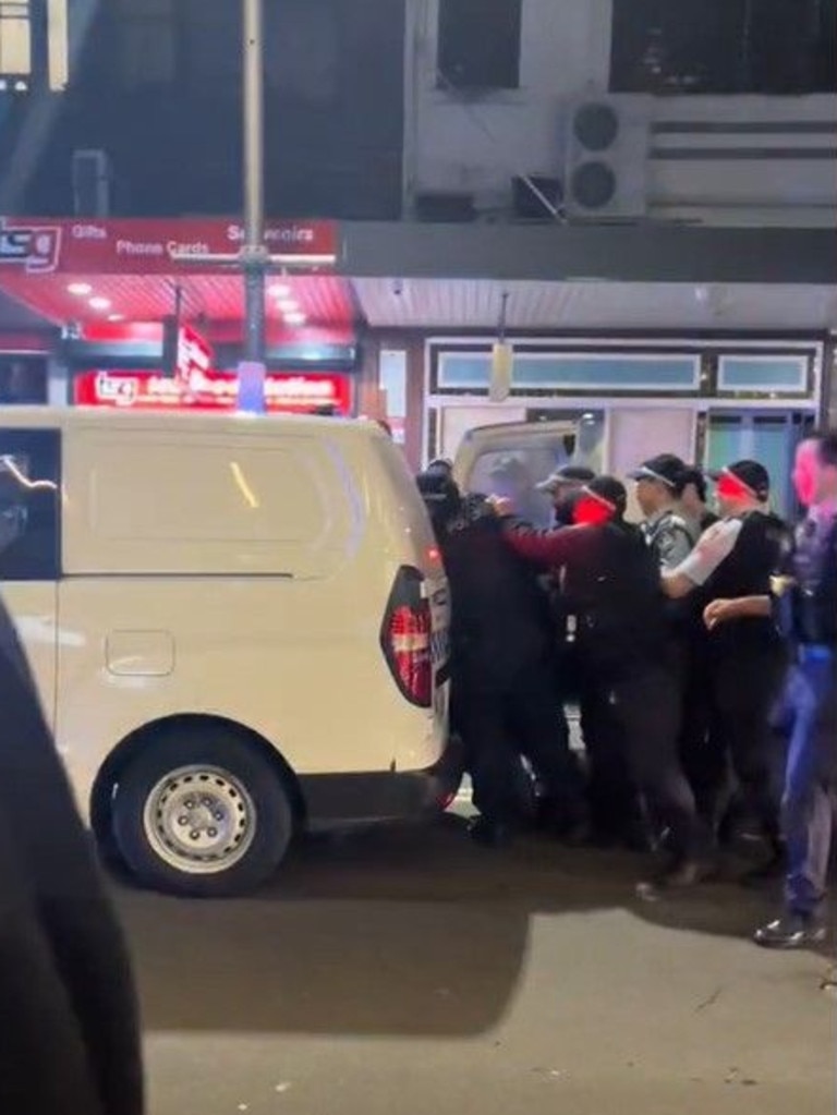 It took at least 10 officers to arrest the alleged offender. Picture: TikTok/ Brazigga