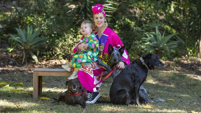 Meagan Babore and her dogs are part of the Brisbane Festival. Pictured with her daughter Queenie Dell and dogs Scout, Brett and Steven. Picture: Mark Cranitch