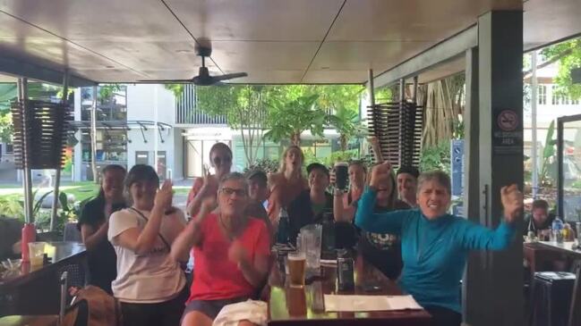 US tourists and Cairns locals cheer on the Matildas ahead of their quarter final match against France 