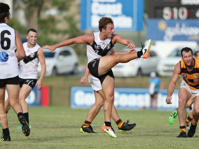 QAFL, Southport Sharks take on Aspley in a practice match at Southport. Southport's James Holland kicks for goal.Picture by Scott Fletcher