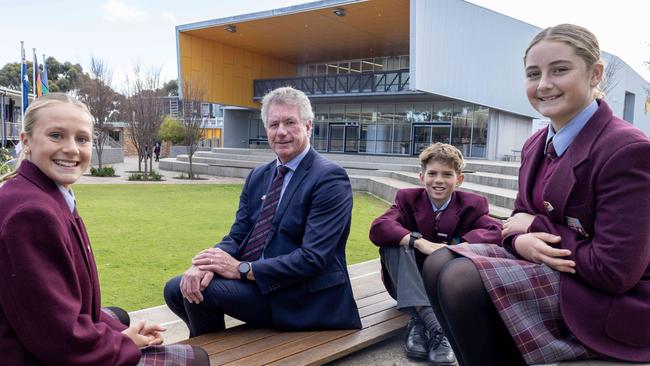 Cardijn College principal Steve Byrne with year 7 students Mackenzie Peterson, 13, Will Gill, 12, and Ruby Withers, 13. Picture: Kelly Barnes