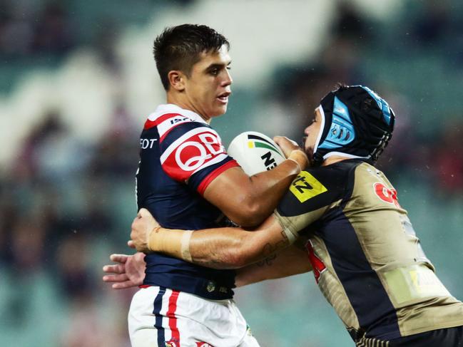 SYDNEY, AUSTRALIA - APRIL 18: Jayden Nikorima of the Roosters is tackled by Jamie Soward of the Panthers during the round seven NRL match between the Sydney Roosters and the Penrith Panthers at Allianz Stadium on April 18, 2016 in Sydney, Australia. (Photo by Matt King/Getty Images)