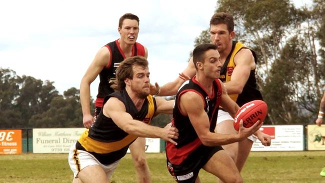 AFL Yarra Ranges Div 1 round 18 match between Emerald and Woori Yallock. Woori Yallock 12. 11 (83) defeated Emerald 8. 11 (59). Emerald’s Matthew Dompietro attempts to race away from Woori Yallock’s Jake Matthews. Picture: Robyn Kuys