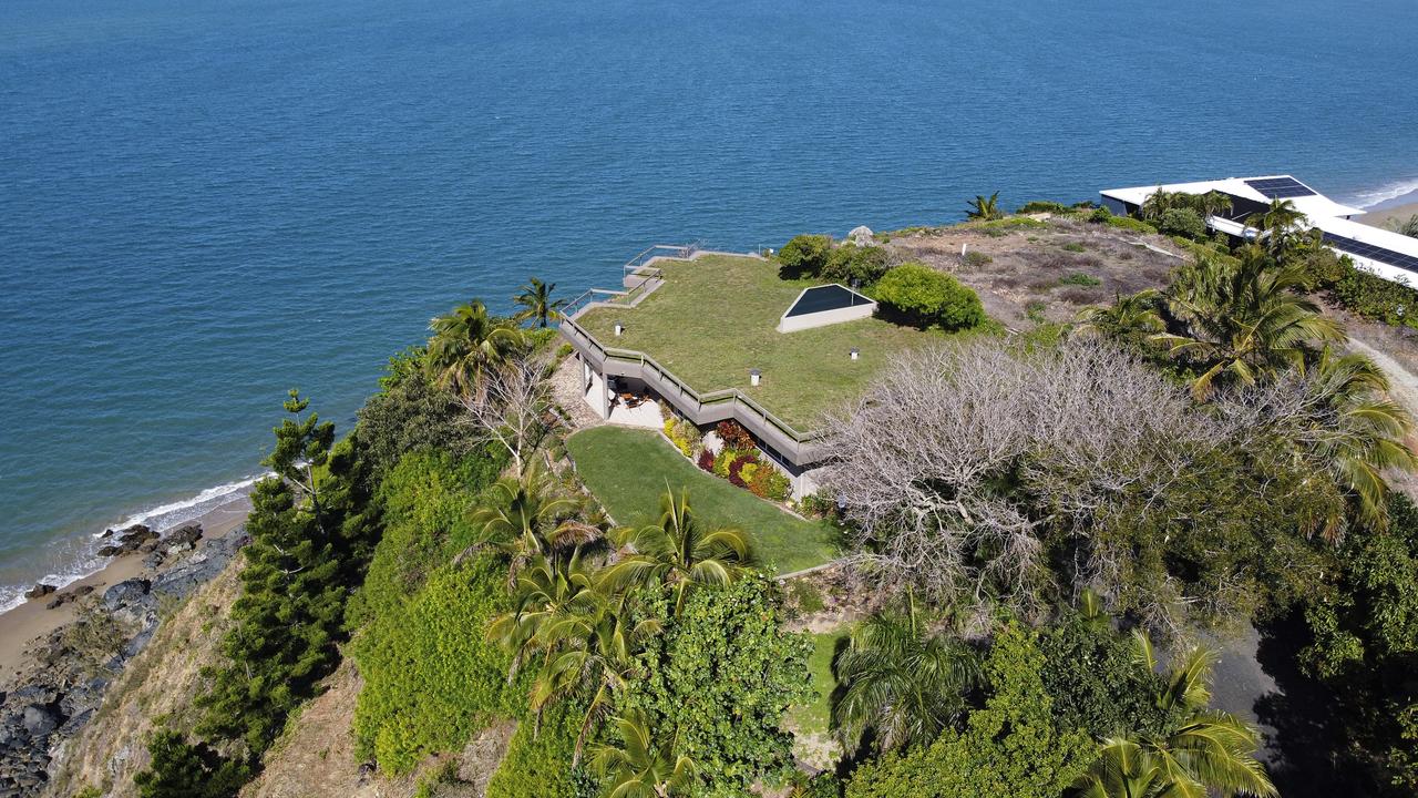 From the sky, it’s almost hard to tell there’s a home under the grass roof.