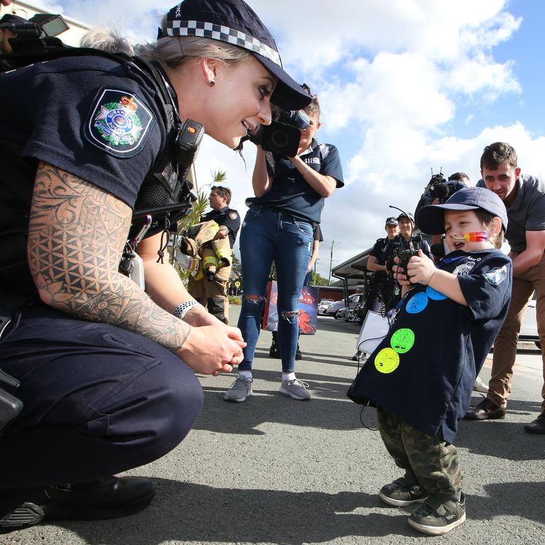 Four-year-old Slater, from Labrador was diagnosed with brain cancer when he was 17-months-old and has been given just a 10-20 per cent chance of surviving to his seventh birthday. Constable Zoe Tidswell from the Coomera Police Station helped to organise a day with his police heroes to lift Slater’s spirits. Picture: Glenn Hampson