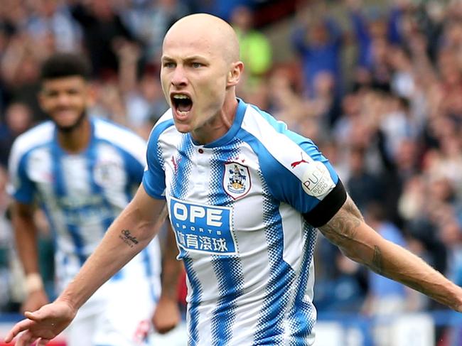 HUDDERSFIELD, ENGLAND - AUGUST 20:  Aaron Mooy of Huddersfield Town celebrates scoring his sides first goal during the Premier League match between Huddersfield Town and Newcastle United at John Smith's Stadium on August 20, 2017 in Huddersfield, England.  (Photo by Jan Kruger/Getty Images)