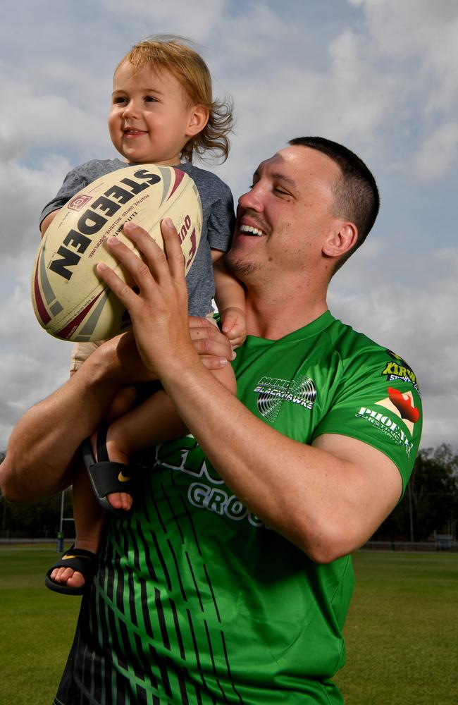 Cade Maloney, with son Lenny, 18 months, will be the first Townsville Blackhawk to sign with the South Sydney Rabbitohs under the club's landmark agreement with the QRL club. Picture: Evan Morgan