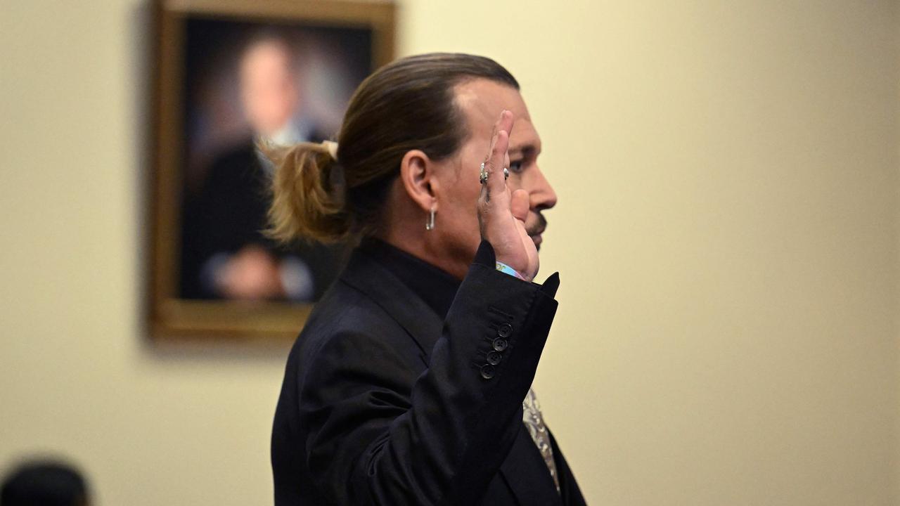 Johnny Depp is sworn in before his testimony. Photo: Jim Watson/AFP