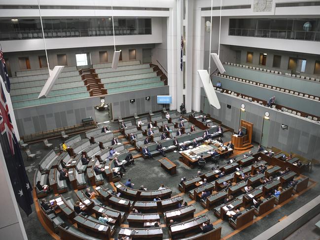 Overview of the chamber during Question Time under rules of social distancing in the House of Representatives at Parliament House in Canberra, Monday, March 23, 2020. (AAP Image/Lukas Coch) NO ARCHIVING