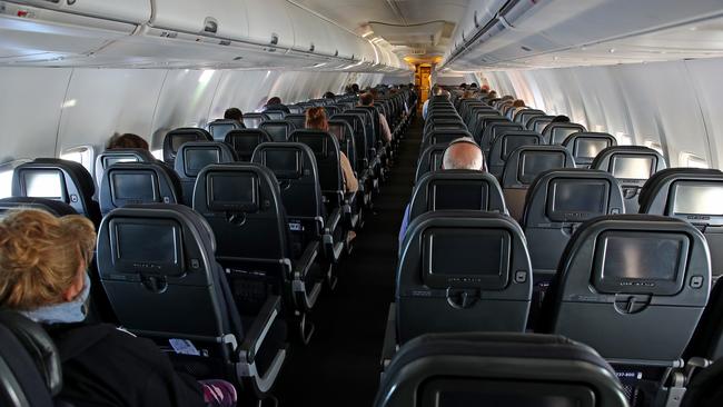 A near empty plane on a Qantas flight from Sydney to Melbourne. Picture: Toby Zerna