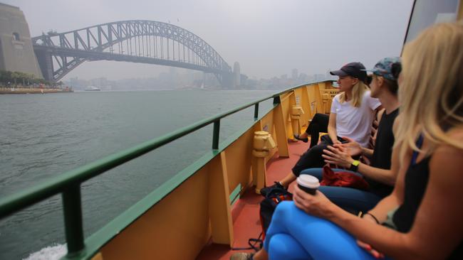 Bushfire smoke in big cities is also set to reduce consumer spending, JPMorgan warns. Picture: AAP