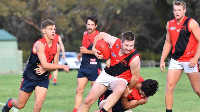 Morphett Vale’s Tyron Bennetts, in action against Flagstaff Hill earlier this year, booted three goals in the Emus’ win over Happy Valley on Saturday. Picture: AAP/ Keryn Stevens