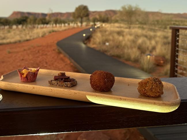 Kangaroo on a crouton is among several canapes serves at Kings Canyon Light Towers at Sunset. Picture: Rebecca Borg