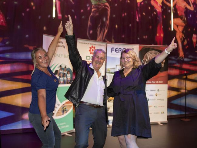 Mackay Mayor Greg Williamson get into the disco spirit with representatives for the 2022 Mayor’s Charity Ball fundraising recipients, Ronald McDonald House Charities North Australia Mackay and Whitsundays community engagement executive Samantha Lee (left) and Heart Kids Queensland manager Holly Williams. Picture: Contributed