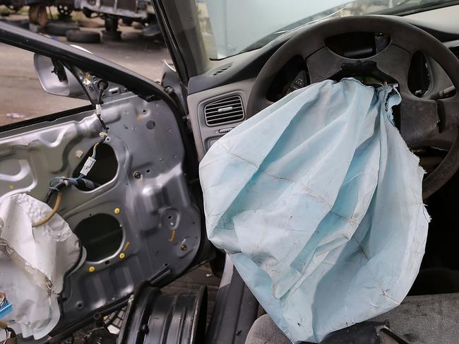 MEDLEY, FL - MAY 22: A deployed airbag is seen in a 2001 Honda Accord at the LKQ Pick Your Part salvage yard on May 22, 2015 in Medley, Florida. The largest automotive recall in history centers around the defective Takata Corp. air bags that are found in millions of vehicles that are manufactured by BMW, Chrysler, Daimler Trucks, Ford, General Motors, Honda, Mazda, Mitsubishi, Nissan, Subaru and Toyota. Joe Raedle/Getty Images/AFP == FOR NEWSPAPERS, INTERNET, TELCOS & TELEVISION USE ONLY ==