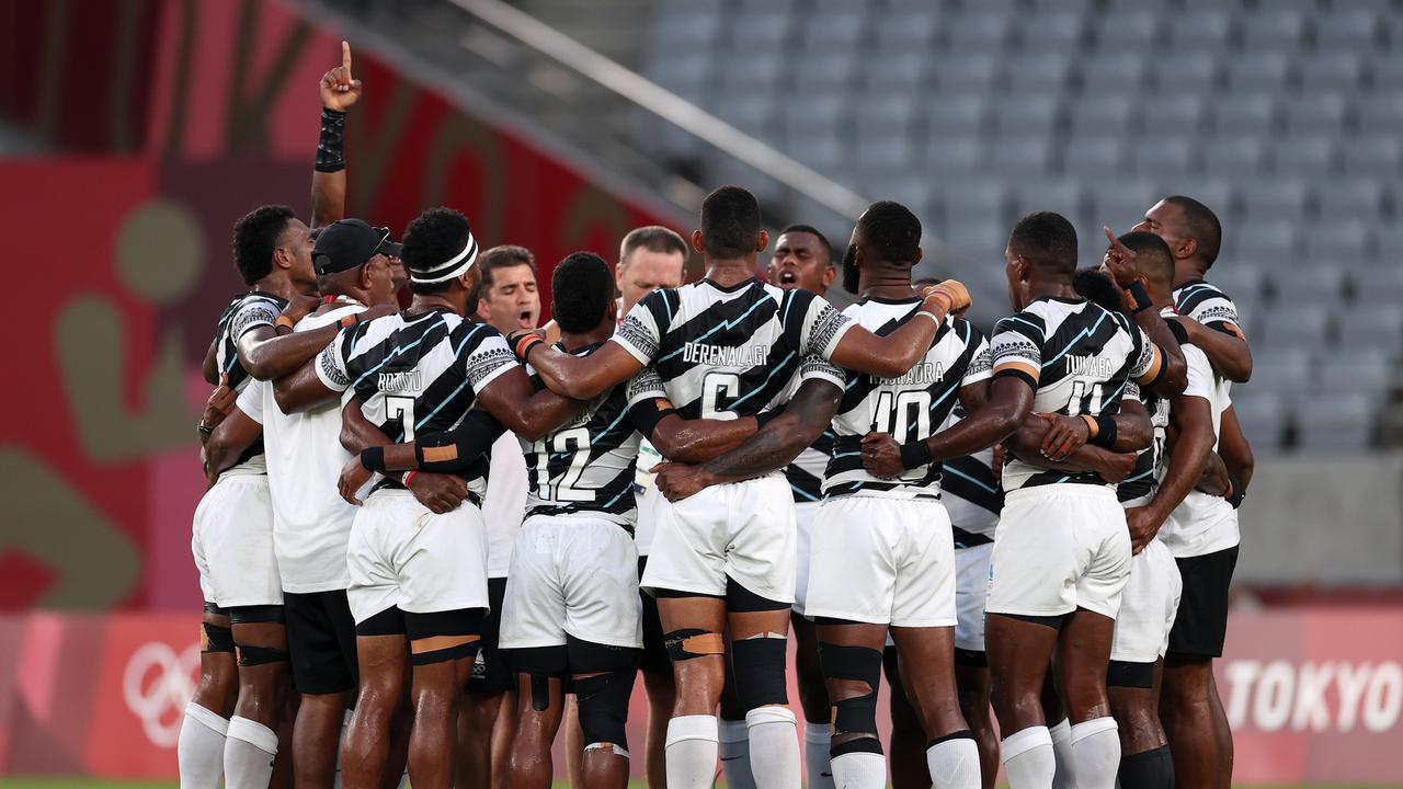 Fiji sing a song in a huddle following their gold medal success at Tokyo Stadium on July 28, 2021 in Chofu, Tokyo. Photo: Getty Images