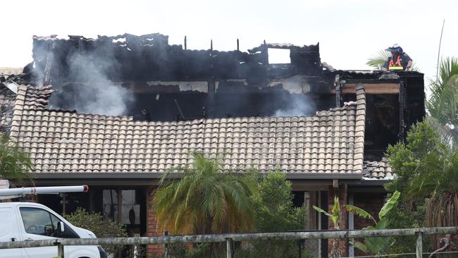 The home of country singer Adam Brand goes up in smoke at Holyrood Rd Maudsland. Emergency services at the scene. Picture Glenn Hampson