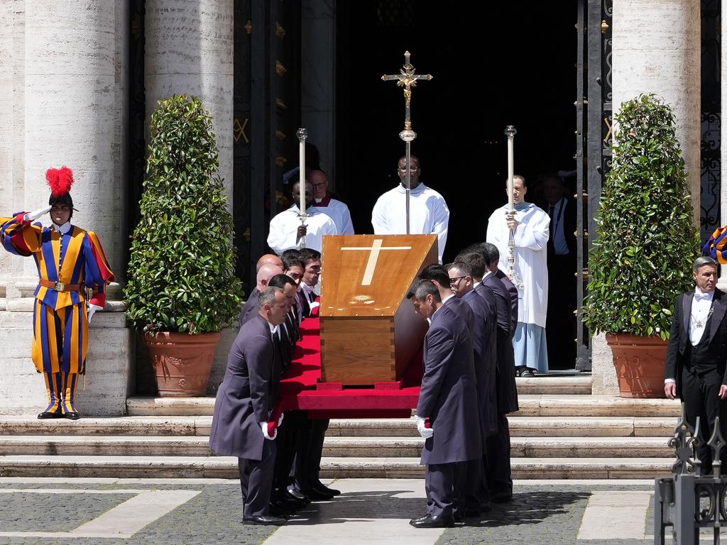 The coffin of late Pope Francis is carried by pallbearers into Santa Maria Maggiore Basilica. Picture: AFP