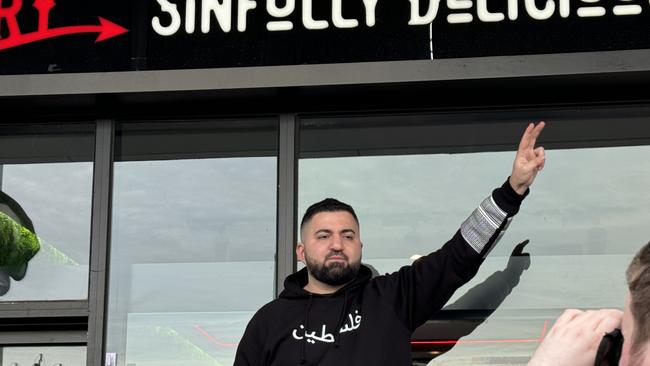 Hash Tayeh addressing protesters outside the Coburg North Burgertory Picture: Olivia Jenkins